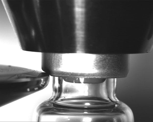 Observing the Sealing Process of Pharmaceutical Vial Aluminum Caps